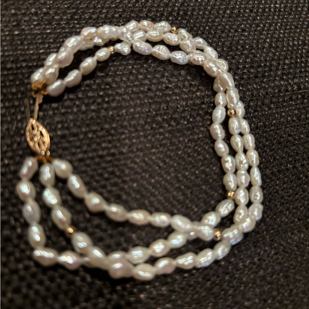 14 K gold by PJS Yellow gold Baroque  pearls three strand bracelet